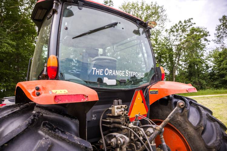 Rob Morrill has named his Kubota tractor 'The Orange Stepson.'