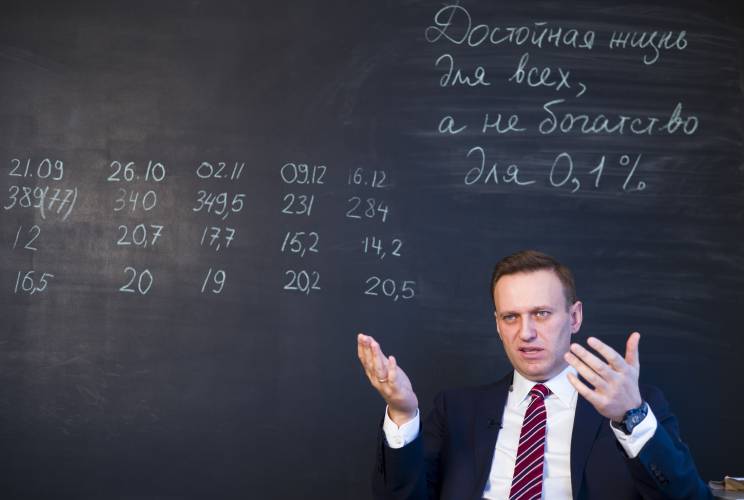 FILE - Russian opposition politician Alexei Navalny gestures while speaking during his interview to the Associated Press in Moscow, Russia on Dec. 18, 2017. Alexei Navalny, the fiercest foe of Russian President Vladimir Putin who crusaded against official corruption and staged massive anti-Kremlin protests, died in prison Friday Feb. 16, 2024 Russia’s prison agency said. He was 47. (AP Photo/Alexander Zemlianichenko, File)