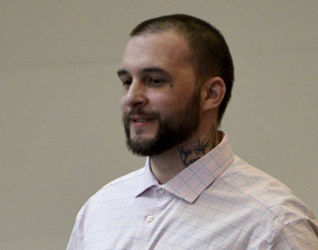 Adam Montgomery enters the courtroom for jury selection ahead of his murder trial at Hillsborough County Superior Court in Manchester, N.H, on Tuesday, Feb. 6, 2024. Montgomery is accused of killing his 5-year-old daughter and spending months moving her body before disposing of it. (David Lane/Union Leader via AP, Pool)