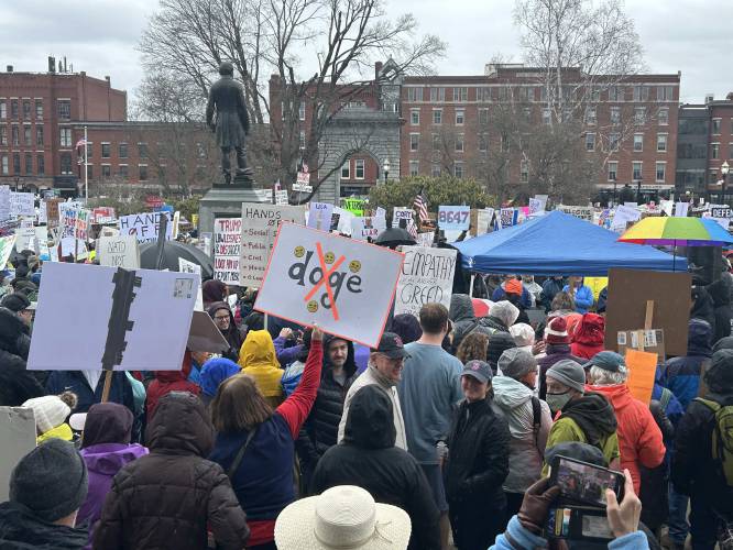 About 2,000 people protest the Trump administration in front of the New Hampshire State House on Saturday, April 5.