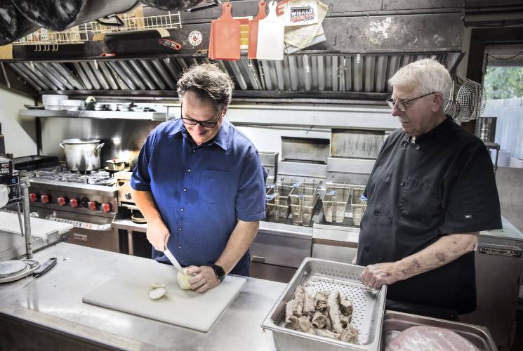 Peter ‘RePete’ Fenton Jr. and Peter ‘Big Pete’ Fenton Sr. in the kitchen of the Appleseed Restaurant in Bradford which has been a staple in the community for the last 48 years.