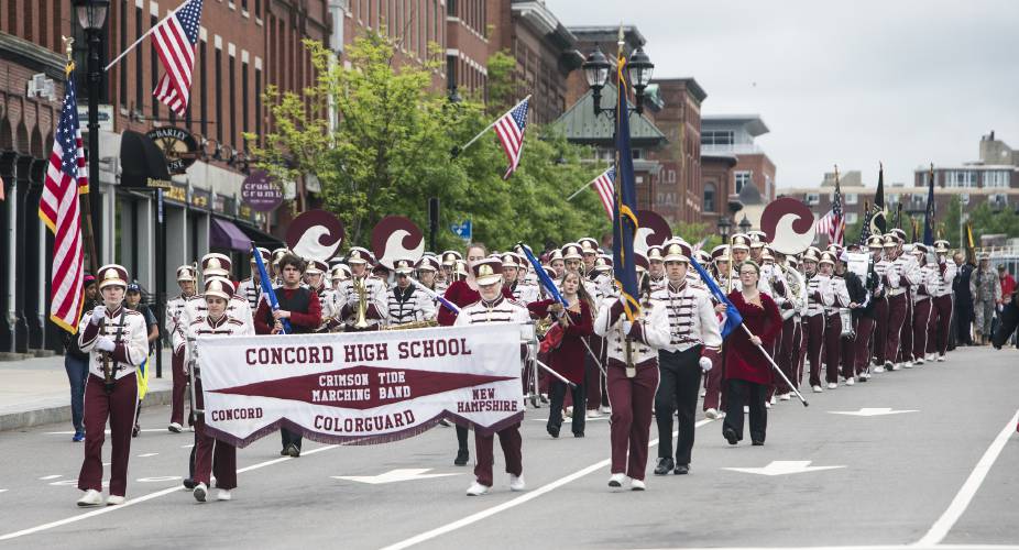 The Concord High School marching band makes its way down Main Street during the Memorial Day parade on Monday, May 29, 2017.