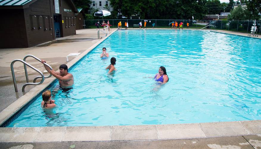 Brave swimmers test out the Kimbal pool Monday even with the afternoon tempertures in the '60s.