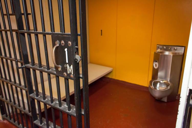 A temporary holding cell is seen at the Concord City Police Department in 2016.