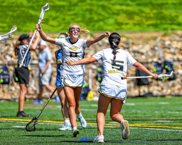 ABOVE: Bow’s Olivia Selleck (8) runs over to celebrate with Charlotte Duncan (5) after Duncan’s third goal of the game tied the D-III girls’ lacrosse semifinal with Gilford at 10-10 late in an eventual OT loss on June 1.