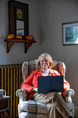 Jean Ver Hoeven, the Concord town crier in her South End home. To honor their efforts, they are receiving a group volunteer service award at Volunteer NH’s 2024 Spirit of NH Awards Ceremony on Monday.