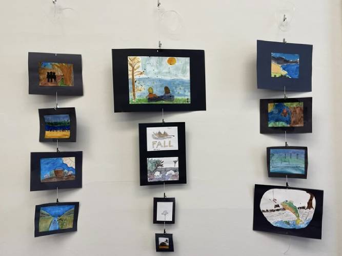 Henniker students were tasked with representing Azalea park and what it means to them through illustrations that now hang in the Tucker Free Library