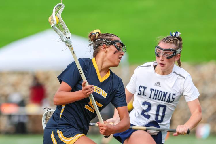 Bow freshman midfielder Vita Flagg (5) efficiently moved the ball for the Falcons and scored a goal in the D-III semis.