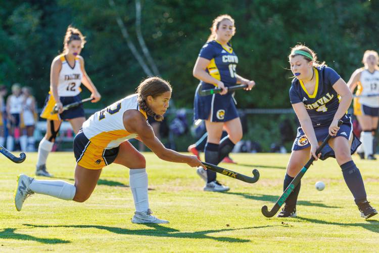 Bow freshman Peyton Vaughn crosses the ball in to the circle past ConVal’s defense. She had three assists and one goal from the right wing in her varsity debut.
