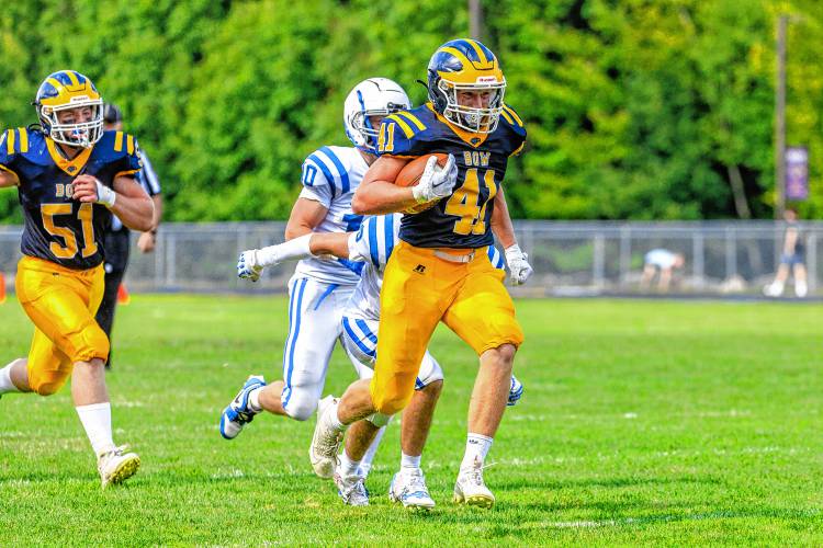 Bow running back Chase Flagg breaks away from a defender in Bow football's season opener at home against Pelham on Saturday. Flagg gained 30 yards on the play.