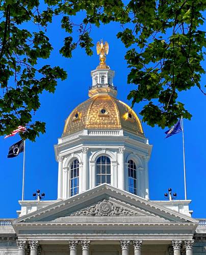 The State House dome in downtown Concord. The State House dome in downtown Concord.