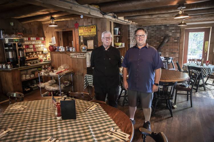 Peter ‘Big Pete’ Fenton Sr. And Peter ‘RePete’ Fenton Jr. in the main room of the Appleseed Restaurant in Bradford, which has been a staple in the community for the last 48 years.