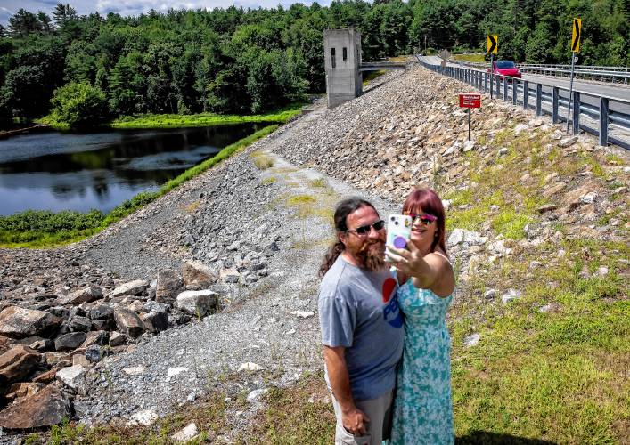 Scott and Sarah Yeaton of Deering take a selfie before going on the tour of the Hopkinton Dam on Route 127 on Saturday, July 20, 2024.