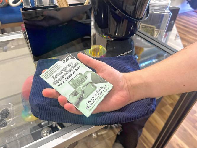 James Roesener, manager at Thorne’s of Concord holds a booklet he made that provides information on how to use emergency contraceptives