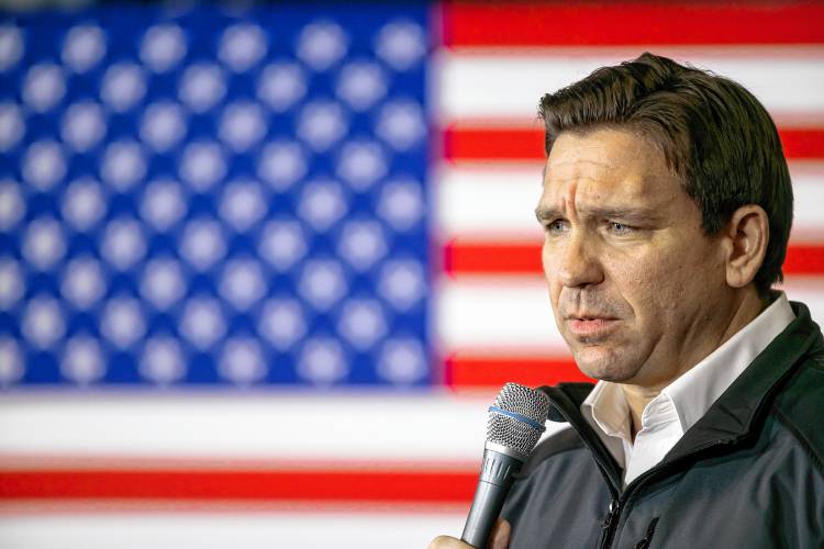 Florida Governor Ron DeSantis speaks to the crowd at the Grappone Center on Friday, December 15, 2023 for a Never Back Down event in Concord.