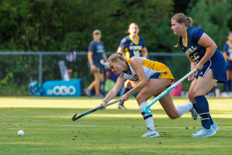 Josie Johnson scores on a breakaway attack to widen Bow’s lead in the first quarter. Bow won its season opener at home, 8-0.