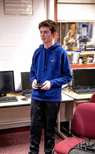 Bow junior Matthew Kropp is all business as he competes with a team from Texas at their epsorts match at the Bow High School library on Wednesday, November 13, 2024.
