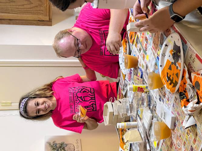 Cheyenne Boucher and Owen Sansoucie have been friends since 2014, when they were matched together as Best Buddies at Pembroke Academy. They recently got together to make t-shirts and decorate bookmarks to fundraise for the Best Buddies Champion o the Year Gala.