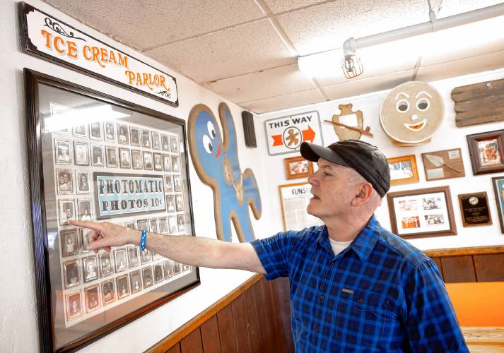 Fun Spot co-owner Dave Lawton shows the classic photo booth inside the facility on Monday, May 6, 2024. Lawton says that on a rainy day in the summer, the arcade is full of families that have come to the Lakes Region.