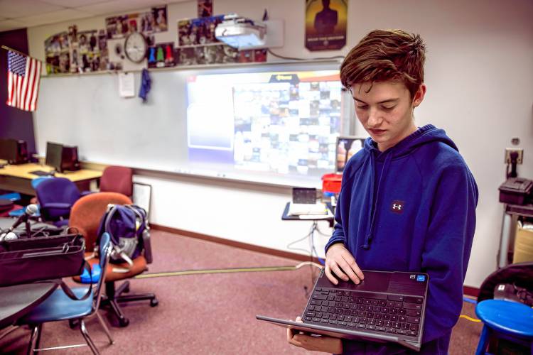 Bow junior Matthew Kropp is all business as he competes with a team from Texas at their epsorts match at the Bow High School library on Wednesday, November 13, 2024.