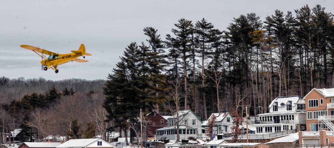 A plane approaches to land at the Alton Bay Ice Runway on Lake Winnipesaukee.