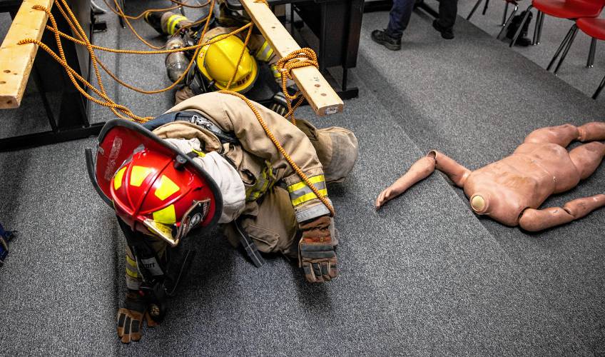 Addison “Nails” Bergeron leads the group through the obstacle course as they get to victims to rescue at their CRTC firefighter class at Concord High School on Thursday, March 7, 2024.