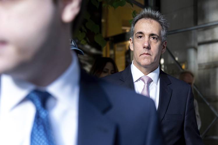Michael Cohen leaves his apartment building on his way to Manhattan criminal court, Monday, May 13, 2024, in New York. (AP Photo/Julia Nikhinson)