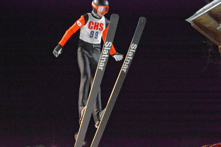 Concord’s Sebastian Christie flies through the air at the NHIAA Ski Jumping State Championship at the Roger Burt Memorial Jump at Oak Hill in Hanover on Friday. Christie, Concord's only jumper, finished eighth.