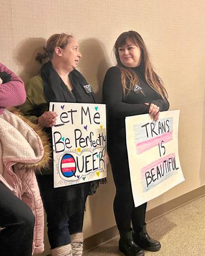 About a hundred people lined the committee room and halls of the Legislative Office Building to protest a House bill that would allow the separation of people by biological sex in certain circumstances.
