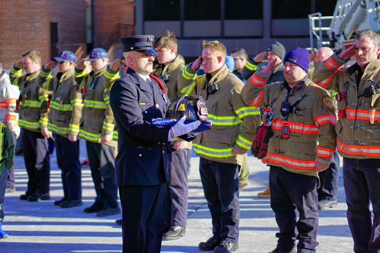Local firefighters salute Christopher “CJ” Girard, who passed suddenly this weekend after a brief illness.