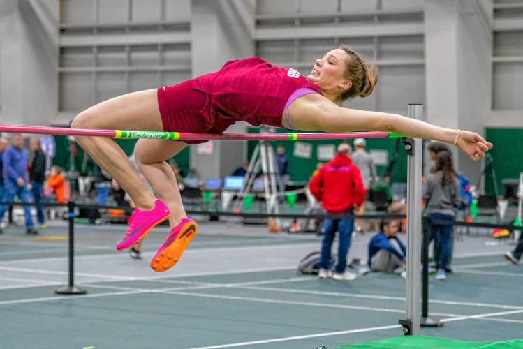 Concord’s Ella Goulas clears the high jump bar at the NHIAA Division I indoor track and field championship on Feb. 11 at Plymouth State. Goulas won the high jump title by clearing 5-4.