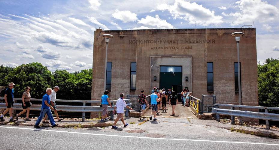 People on the tour of the gatehouse of the Hopkinton Dam on Route 127 in Contoocook on Saturday, July 20, 2024. The Hopkinton-Everett Lakes project provides flood protectionon the Contoocook and Piscataquog rivers, which are tributaries of the Merrimack River.