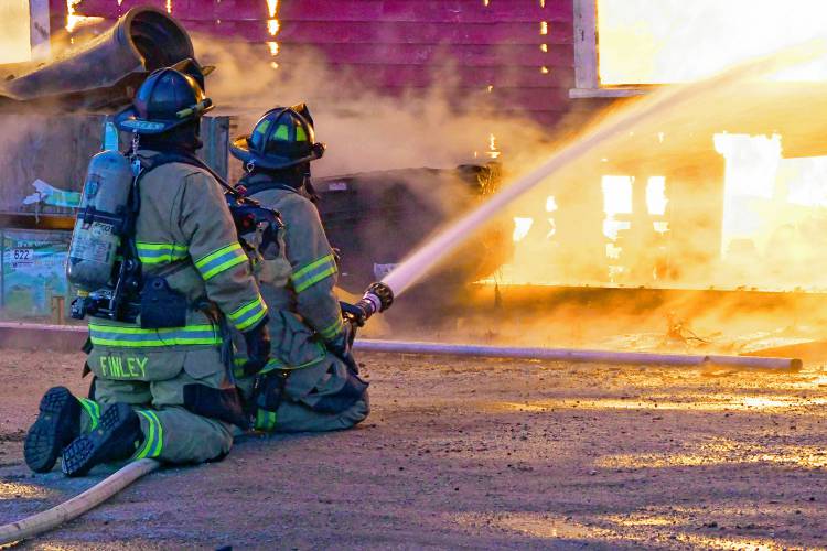 Firefighters work to put out a blaze in Franklin.