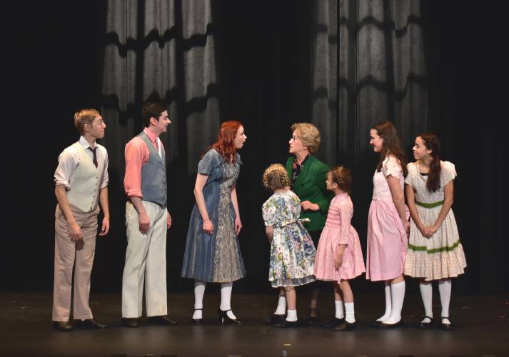 Players president Ellen Burger plays Von Trapp housekeeper, “Frau Schmidt” along with young actors in “The Sound of Music.” The recent sold out production featured 48 community actors on stage and involved 30 more production volunteers off stage. 