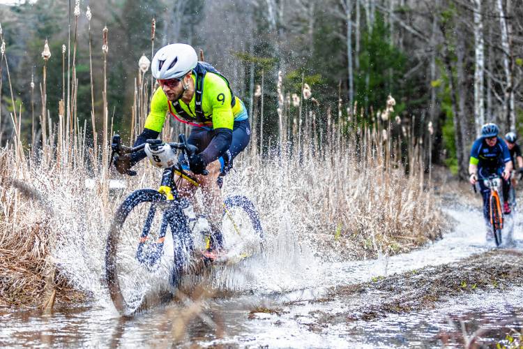 Riders participating in the third annual Pavement Ends Gravel Race that took cyclists through Henniker, Weare and Deering on April 6, 2024.