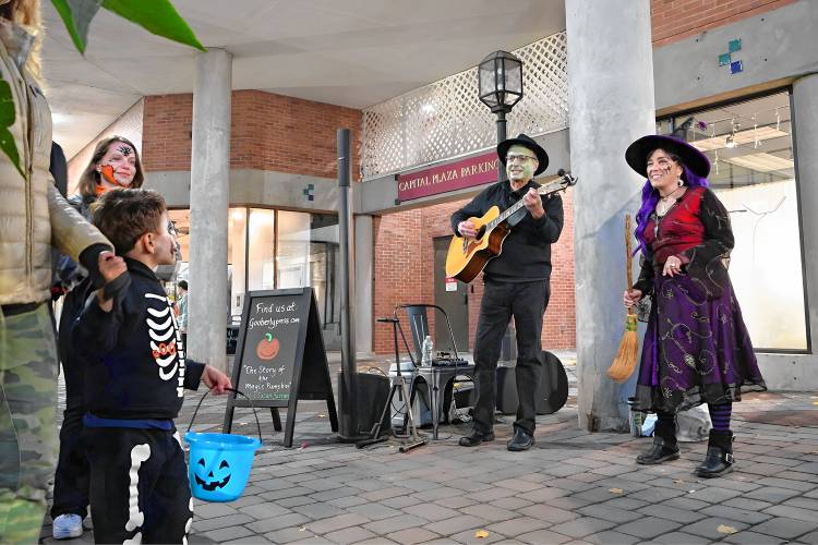 Dave and Susan Bastien performed some spooky songs during the Halloween Howl in downtown Concord on Friday night. 