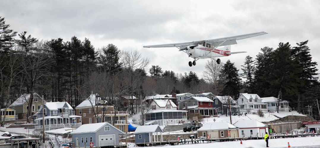 A plane approaches to land at the Alton Bay airport on Lake Winnipesaukee on Sunday, February 2, 2025. The airstrip runway is a minimum of 2, 600 feet long and at least 100 feet wide.