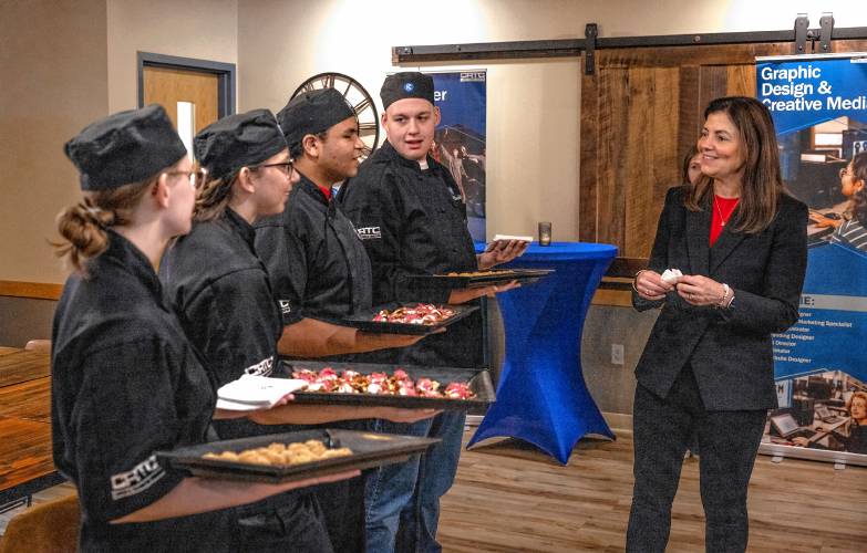 Governor Kelly Ayotte talks with CRTC Culinary students, from left: Claire Ulrich, Eileen Defisser, Malik Ahmed, Jacob Breau at Concord High School as she gets a tour of all the programs at the school.
