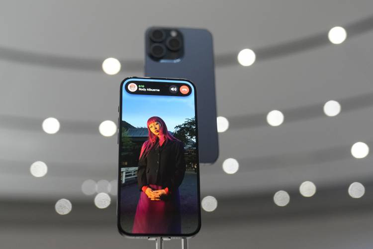 iPhone 15 Pro phones are shown during an announcement of new products on the Apple campus in Cupertino, Calif., Sept. 12, 2023. iPhone 15 Pro phones are shown during an announcement of new products on the Apple campus in Cupertino, Calif., Sept. 12, 2023.