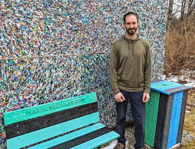 Nathan Gray standing with products made with the chips. Nathan Gray standing with products made with the chips.