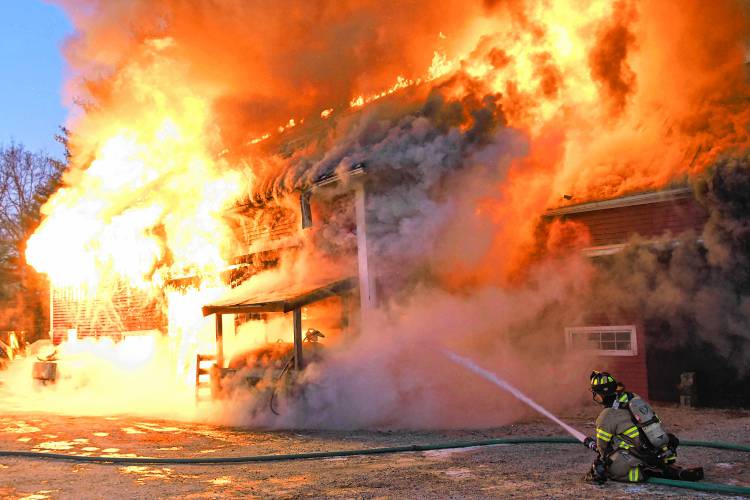 Firefighters work to put out a blaze in Franklin.