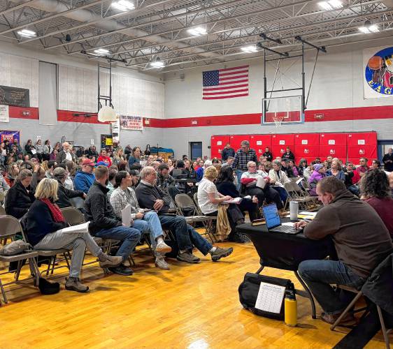 Over 250 residents filled the gym of Epsom Central School at the school district’s budget deliberative session Tuesday.