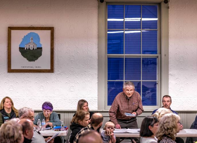 Salisbury Select Board member David Kelly explains a town warrant article at town meeting on Tuesday.