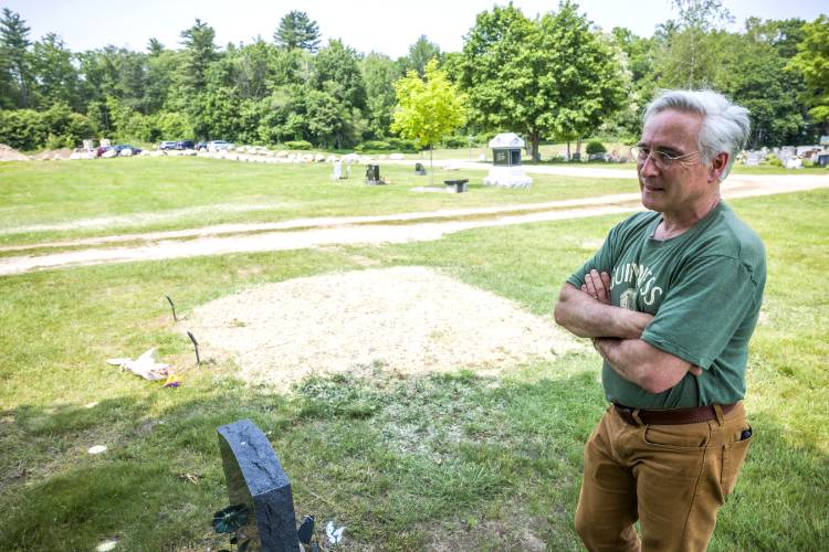 Bill Byrne looks over the burial plots for his daughter, Julia, and grandson, Blake at Blossom Hill Cemetery in Concord on Wednesday, June 4, 2025. Byrne’s daughter, Julia, 26, took the life of her 3-year-old son, Blake, and then her own.