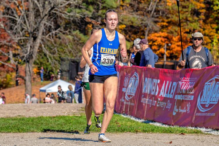 Kearsarge’s Molly Ellison races towards the finish line at the NHIAA Division III girls’ state championship at Derryfield Park in Manchester on Saturday. Ellison finished fourth.