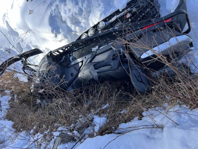 A snowmobile accident on Feb. 24 in which rescuers had to pull the 12-year-old operator out from under the snowmobile. A snowmobile accident on Feb. 24 in which rescuers had to pull the 12-year-old operator out from under the snowmobile.