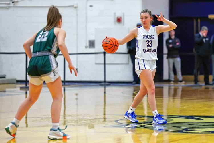 Concord Christian junior Lilli Carlile calls out a play during the Division II girls' basketball championship game at UNH on March 10, 2024.