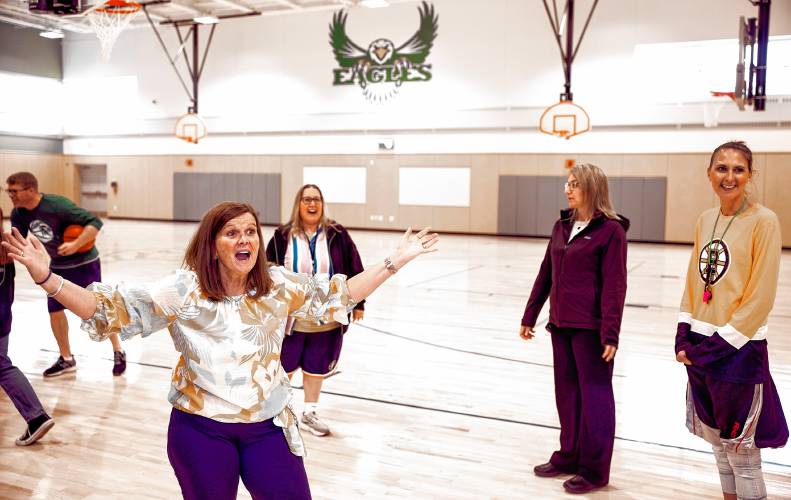 Allenstown principal Shannon Kruger greets students to the school gymnasium on Thursday morning, April 18, 2024. A group of students came to the Allenstown Community School to get a greeting and a tour of the new facility.