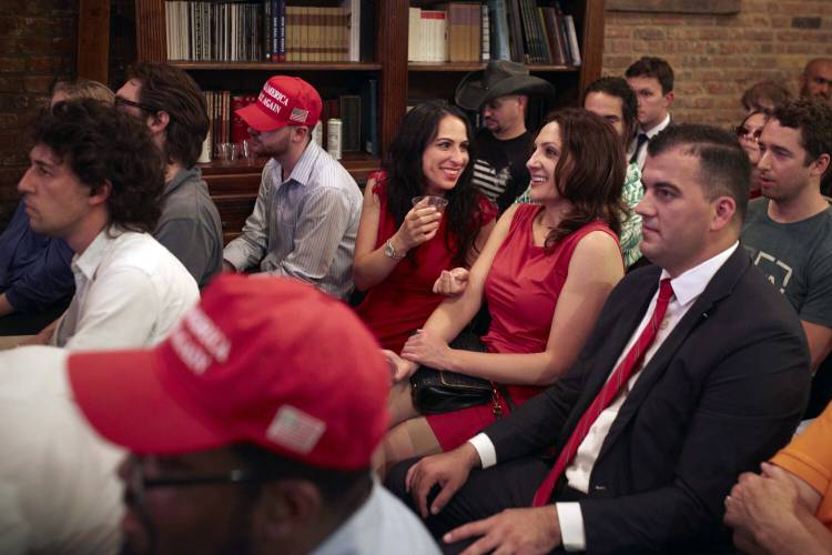 Trump supporters react during the Young Republicans' Presidential debate watch party on Thursday, June 27, 2024, in New York as President Joe Biden faces former President Donald Trump during the first Presidential debate ahead of the 2024 elections. (AP Photo/Andres Kudacki)