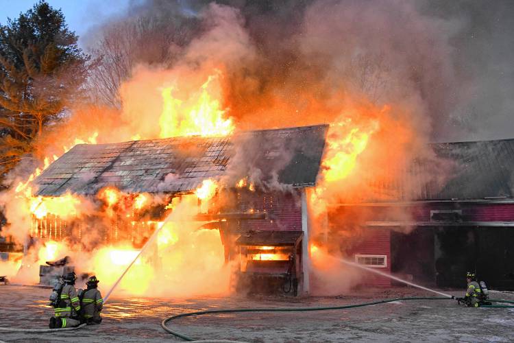 Firefighters work to put out a blaze in Franklin.